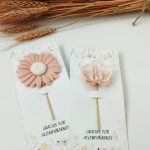 Piruletas de jabón en forma de flor con tarjeta de recordatorio